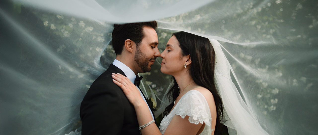 Marisa and Josh in the gardens at their Casa Loma wedding